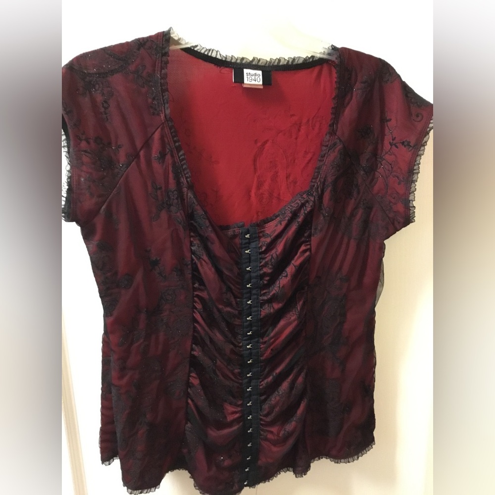 Woman’s lace top with red lining